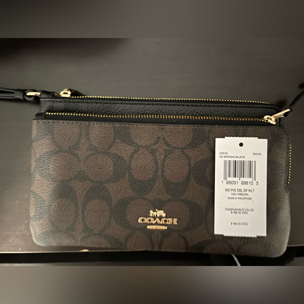 Used once with tag- Coach Signature Zip wallet brown